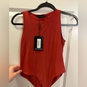 Burnt orange high neck body suit - new with tags